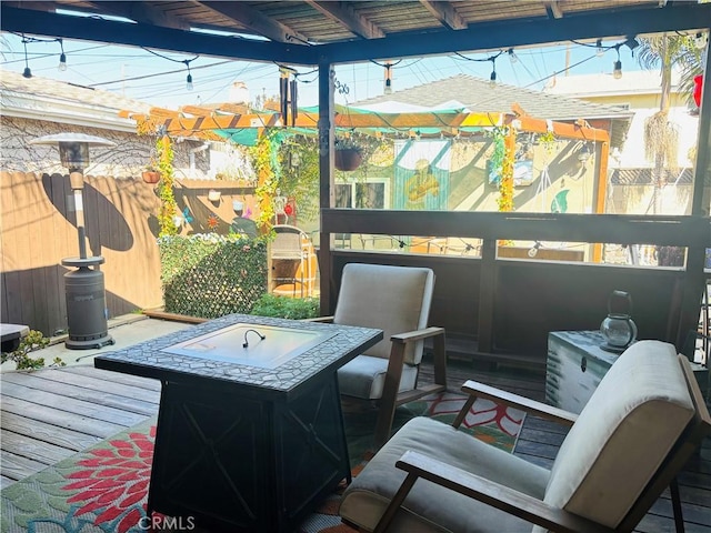 view of patio / terrace with an outdoor fire pit