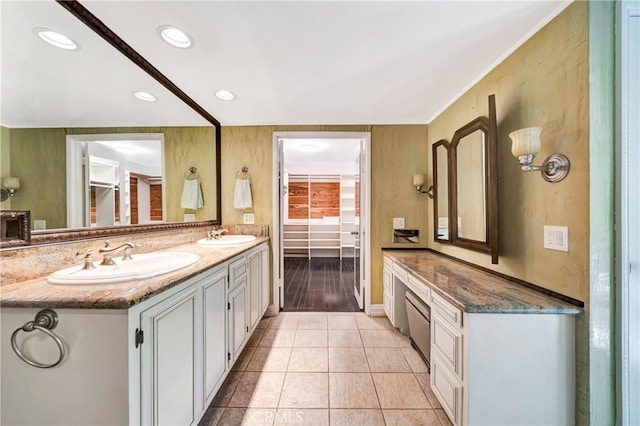 5441 Calvin Ave, Tarzana, CA 91356 - bathroom with recessed lighting, tile patterned flooring, double vanity, and a sink