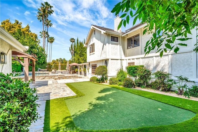 5441 Calvin Ave, Tarzana, CA 91356 - view of yard featuring a patio area