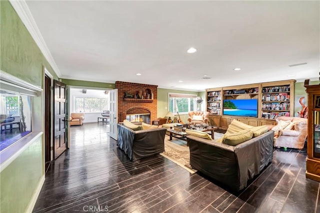 5441 Calvin Ave, Tarzana, CA 91356 - living room with recessed lighting, a brick fireplace, ornamental molding, and wood finished floors