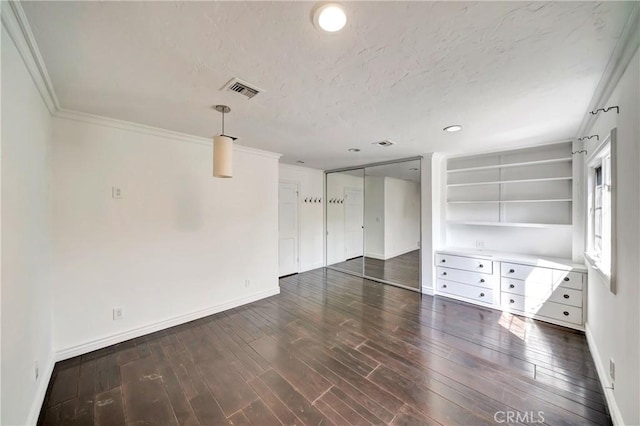 5441 Calvin Ave, Tarzana, CA 91356 - empty room featuring crown molding, visible vents, baseboards, and dark wood-style floors