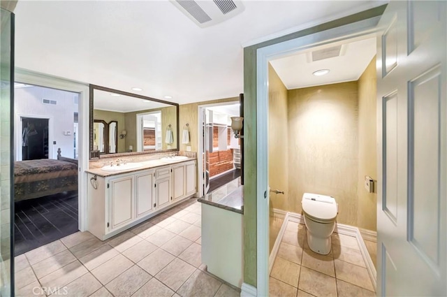 5441 Calvin Ave, Tarzana, CA 91356 - ensuite bathroom featuring tile patterned floors, visible vents, toilet, and ensuite bathroom