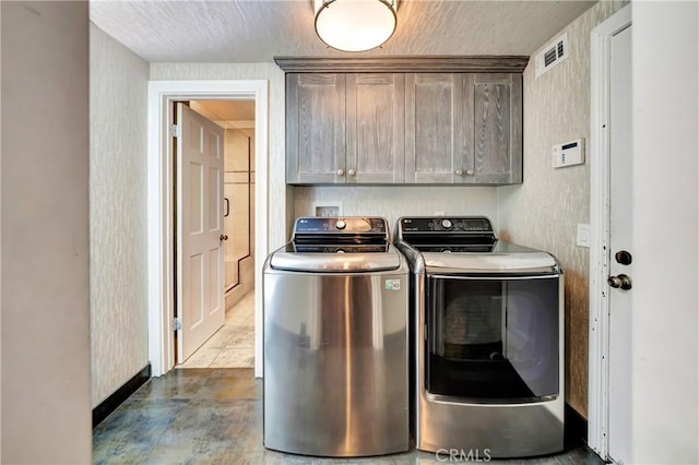 5441 Calvin Ave, Tarzana, CA 91356 - laundry room featuring washing machine and dryer, visible vents, and cabinet space