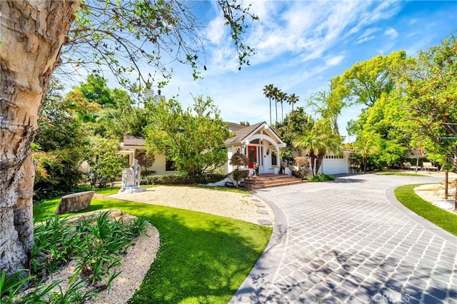 5441 Calvin Ave, Tarzana, CA 91356 - view of front of home featuring stucco siding and decorative driveway