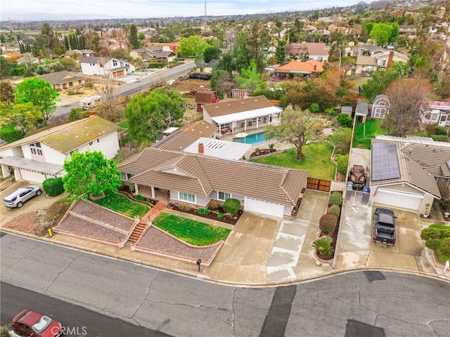 birds eye view of property with a residential view