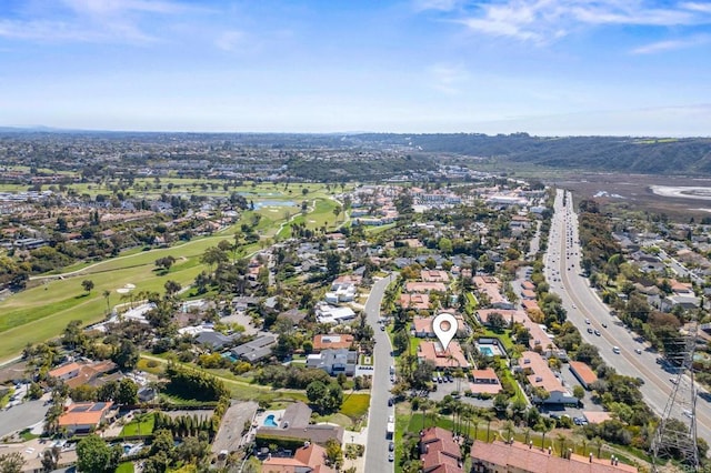 aerial view featuring a residential view and view of golf course