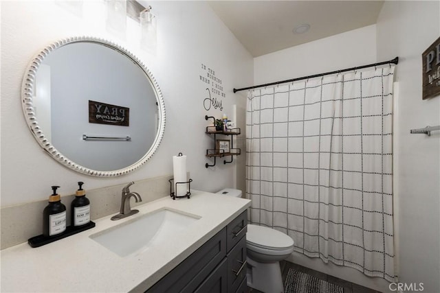 full bathroom featuring vanity, toilet, and shower / bathtub combination with curtain