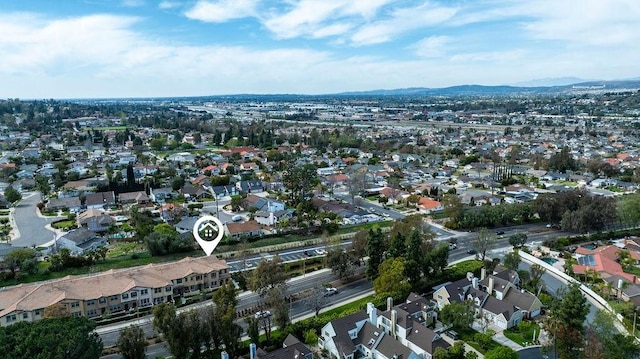 birds eye view of property with a residential view