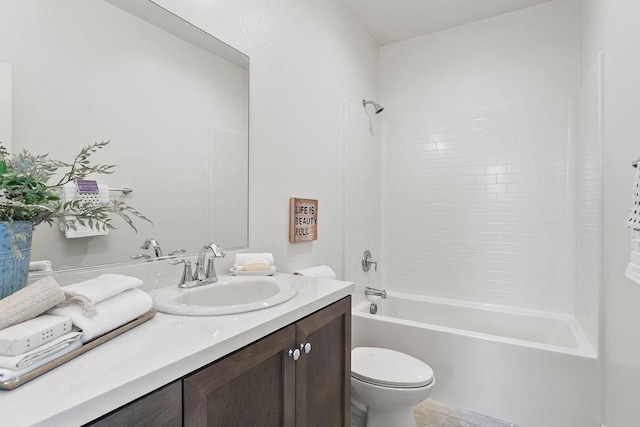 full bath featuring tub / shower combination, toilet, and vanity