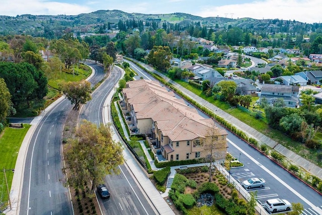 drone / aerial view featuring a mountain view