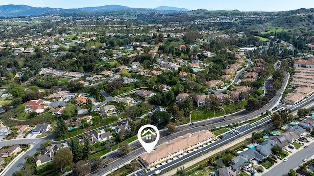 aerial view with a residential view and a mountain view