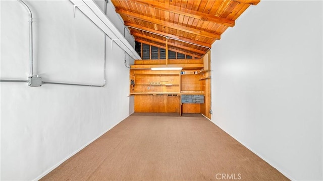 interior space with carpet and wooden ceiling