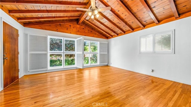 interior space with wooden ceiling, vaulted ceiling with beams, light wood finished floors, and ceiling fan