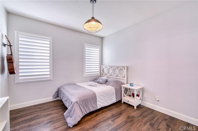 16 Lyra Way, Coto De Caza, CA 92679 - bedroom with wood finished floors and baseboards