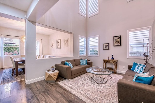 16 Lyra Way, Coto De Caza, CA 92679 - living room featuring plenty of natural light, dark wood-type flooring, and baseboards