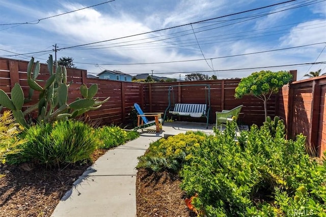 view of yard featuring a fenced backyard