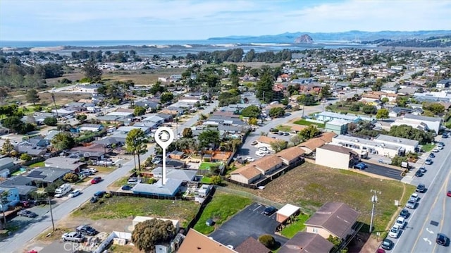 bird's eye view featuring a residential view and a mountain view