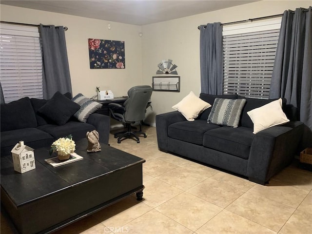 living area featuring light tile patterned floors