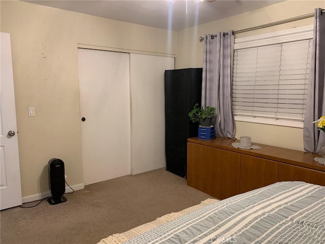 unfurnished bedroom with a closet and carpet