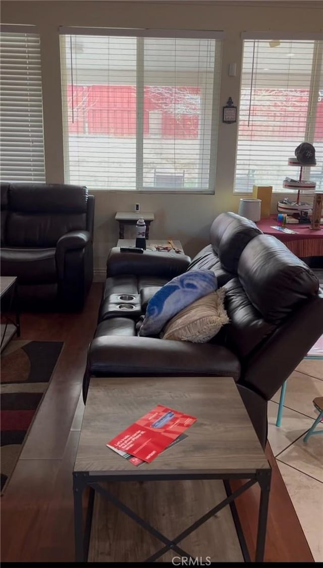 living area featuring tile patterned flooring