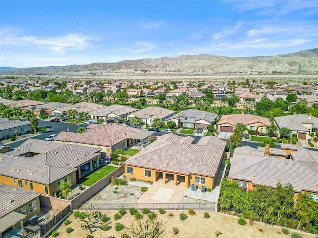 aerial view with a mountain view and a residential view