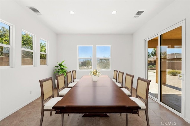 dining area featuring plenty of natural light, recessed lighting, and visible vents