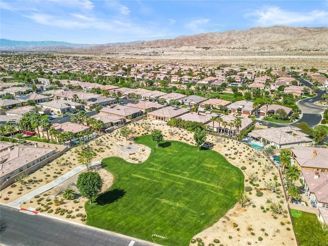 aerial view with a mountain view and a residential view