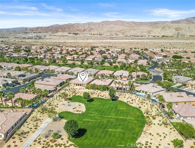 aerial view featuring a mountain view and a residential view