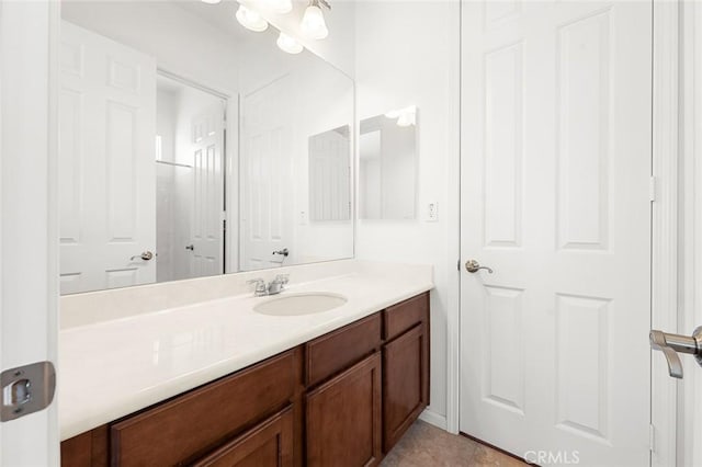 bathroom featuring vanity and tile patterned flooring