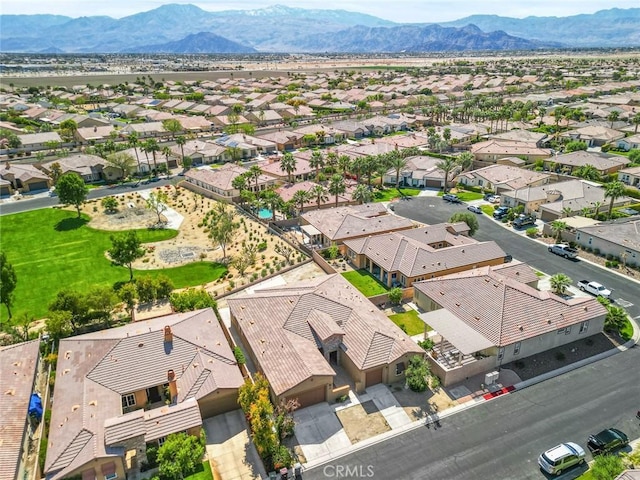 bird's eye view featuring a mountain view and a residential view