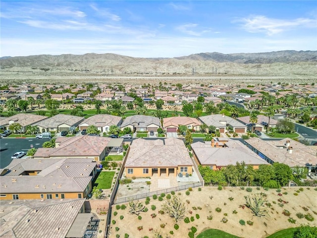 bird's eye view featuring a mountain view and a residential view