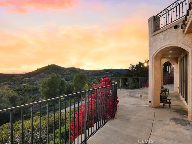 view of patio / terrace featuring a mountain view