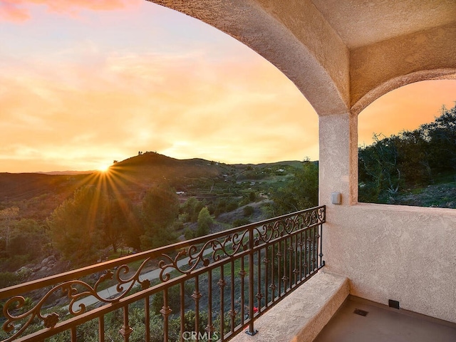 balcony featuring a mountain view