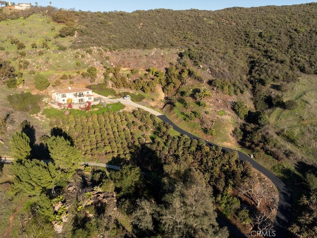 bird's eye view featuring a view of trees