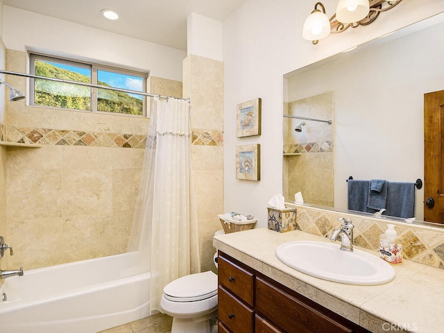 full bathroom featuring tile patterned flooring, vanity, toilet, and shower / tub combo