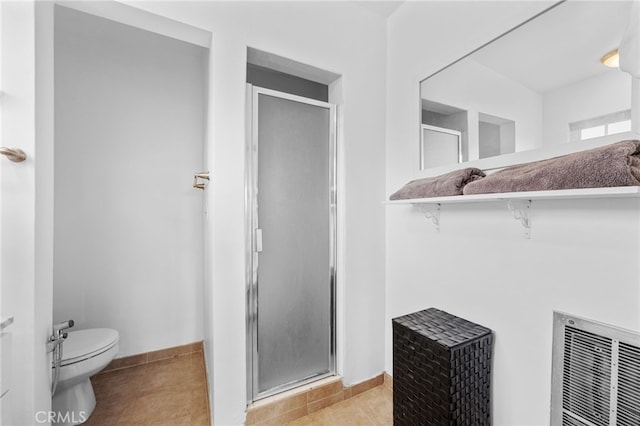 bathroom with a shower stall, visible vents, and tile patterned floors