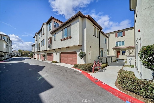 view of road with curbs and a residential view