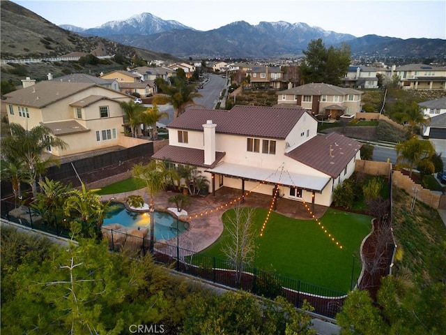 33740 Old Trail Dr, Yucaipa, CA 92399 - aerial perspective of suburban area with a pool and a mountain backdrop