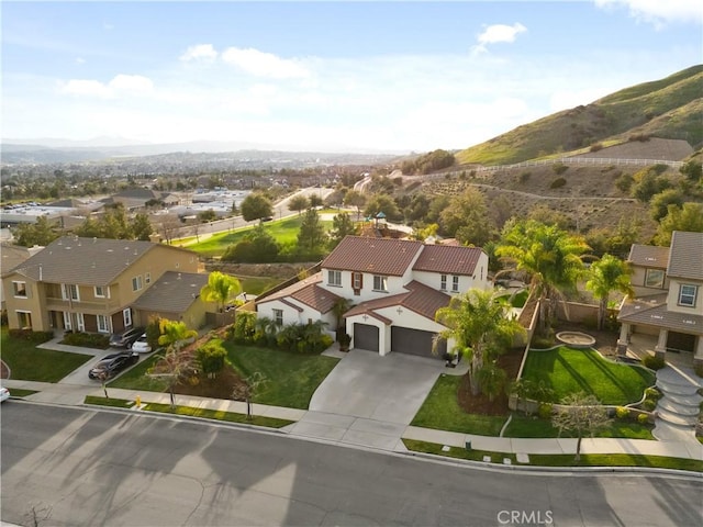 drone / aerial view with a mountain view and a residential view