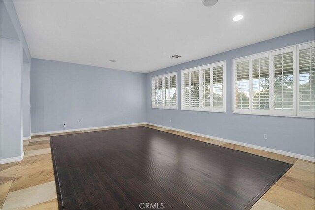 33740 Old Trail Dr, Yucaipa, CA 92399 - empty room featuring baseboards and recessed lighting