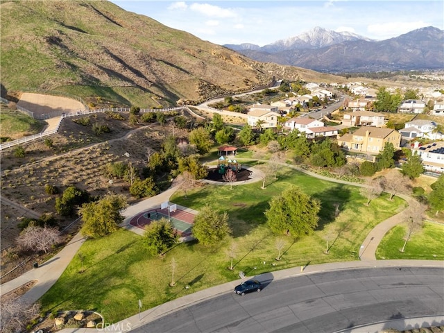 aerial view featuring a mountain view and a residential view