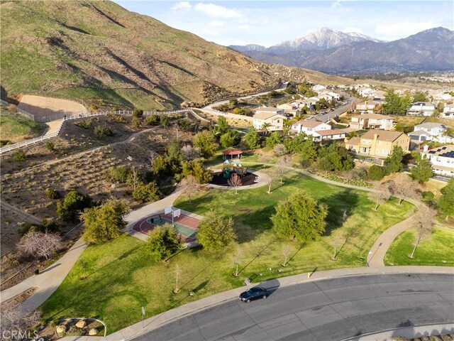 33740 Old Trail Dr, Yucaipa, CA 92399 - aerial overview of property's location featuring a mountain backdrop and nearby suburban area