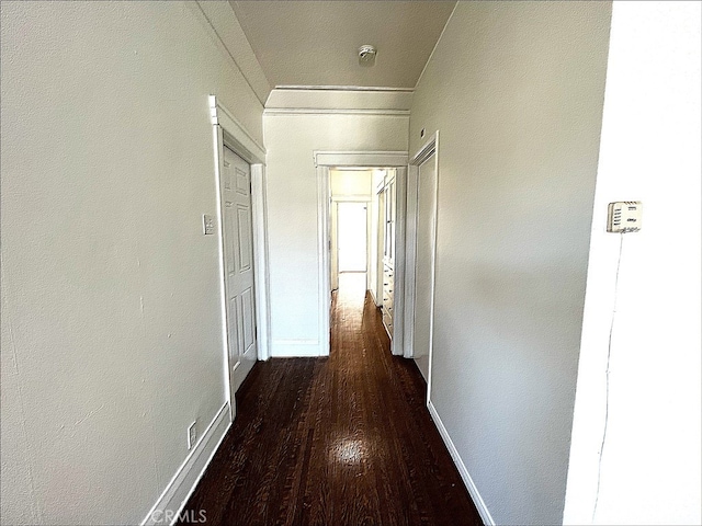332 W 9th St, Long Beach, CA 90813 - corridor featuring crown molding, dark wood-style floors, and baseboards