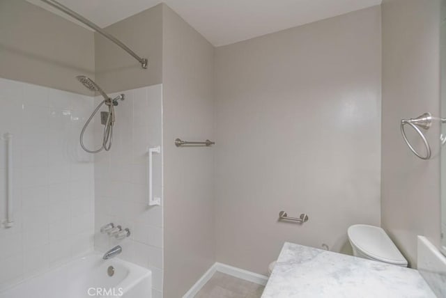 bathroom featuring shower / bath combination, baseboards, toilet, and vanity