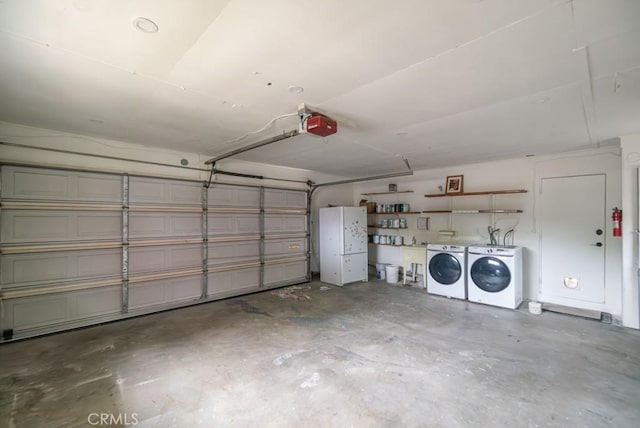 garage featuring washer and clothes dryer