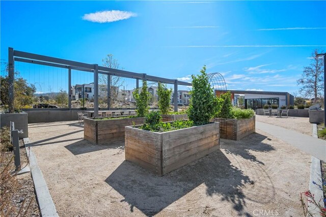 view of home's community featuring a vegetable garden