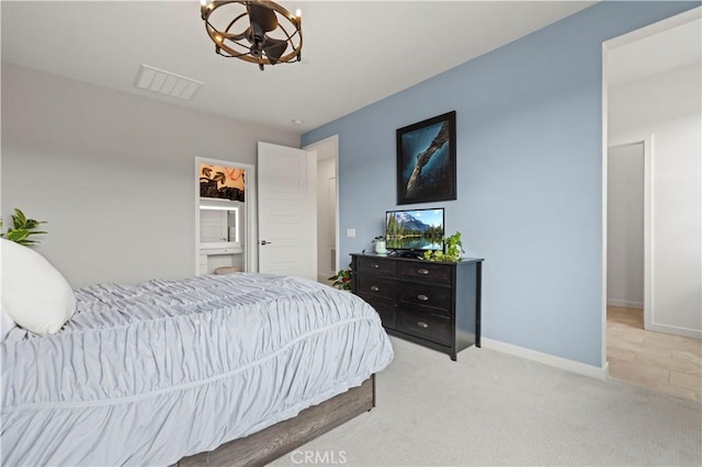 bedroom featuring a notable chandelier, visible vents, carpet flooring, and baseboards