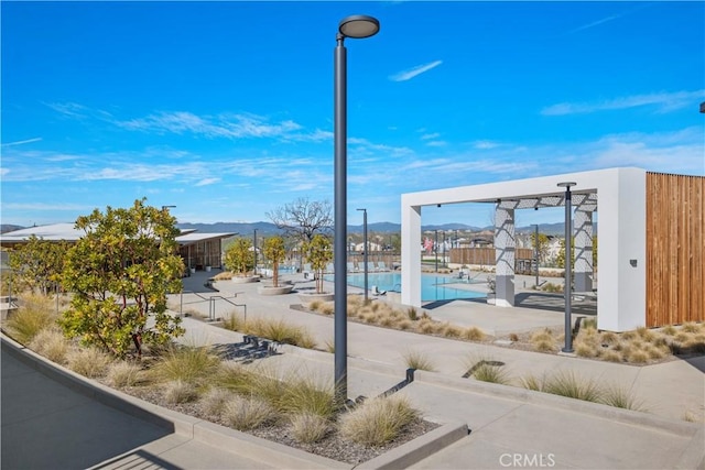 27046 Tanager Ln, Valencia, CA 91381 - surrounding community featuring a swimming pool and a patio
