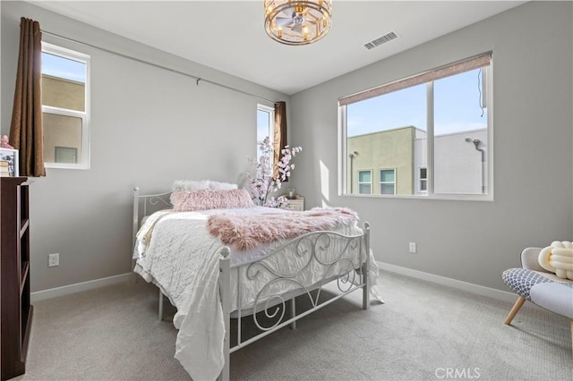 27046 Tanager Ln, Valencia, CA 91381 - carpeted bedroom featuring multiple windows and a chandelier
