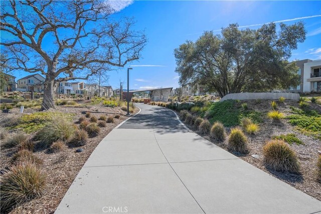 surrounding community with a residential view